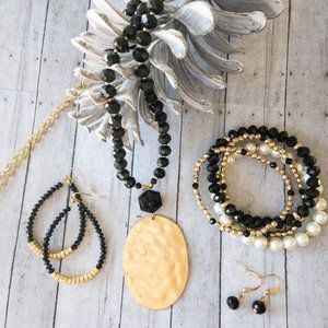 Black and gold beaded necklace, bracelet, and earring set-4 pieces